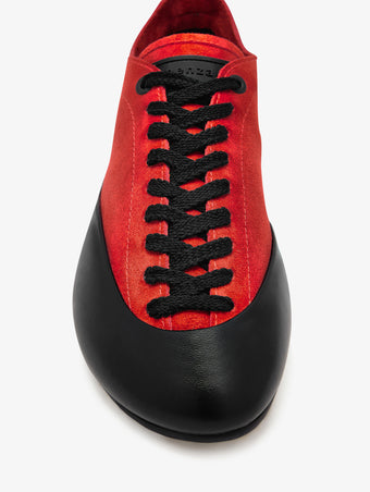 Proenza Schouler aerial image of Arcadia Sneakers in red with black laces
