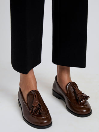 Proenza Schouler Image of model wearing Albers Loafers In Shiny Calf in Cedar
