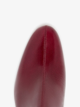 Proenza Schouler Aerial image of Uma Ankle Boots in Slick Calf in Merlot