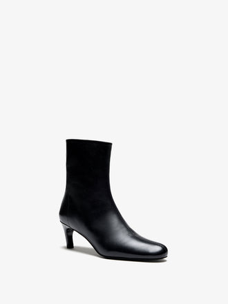 Proenza Schouler 3/4 Front image of Uma Ankle Boots in Tripon in Black