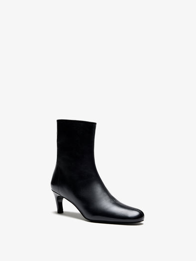 Proenza Schouler 3/4 Front image of Uma Ankle Boots in Tripon in Black