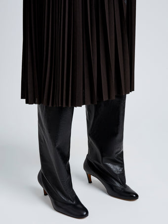 Proenza Schouler Image of model wearing Uma Over The Knee Boots in Slick Calf in Black