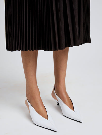 Proenza Schouler Image of model wearing Slash Slingbacks Polished Calf in White