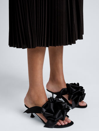 Proenza Schouler Image of model wearing Tee Souvenir Sandals in Satin in Black