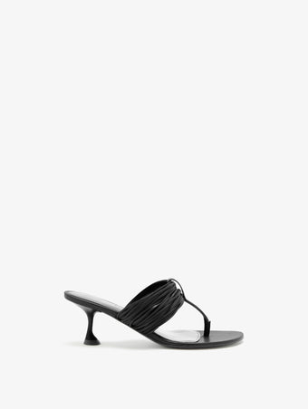 Proenza Schouler side view of Cable T-Strap Sandals in black