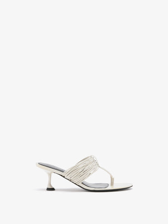 Front image of Cable T Strap Sandals in Ecru