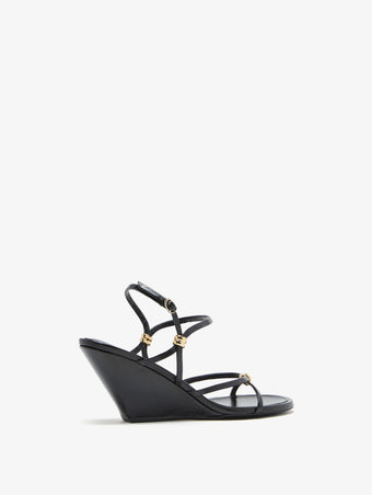 3/4 Back image of Coil Wedge Sandals in Black
