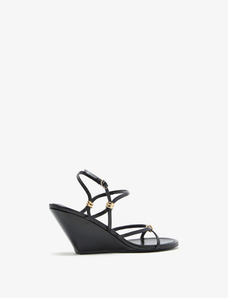 3/4 Back image of Coil Wedge Sandals in Black