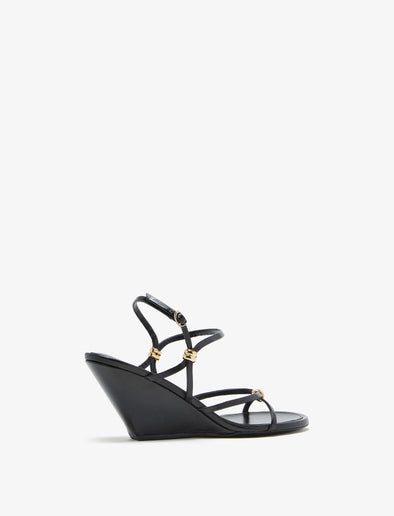 3/4 Back image of Coil Wedge Sandals in Black