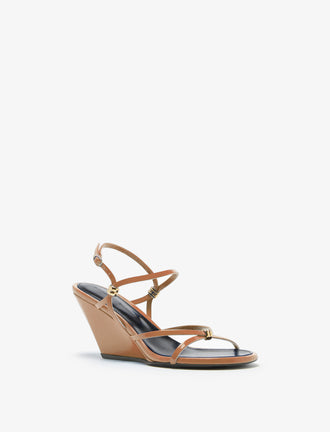 Proenza Schouler front 3/4 image of Coil Wedge Sandals in Slick Nappa in camel