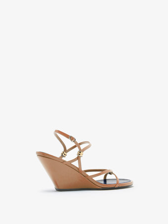 Proenza Schouler back 3/4 image of Coil Wedge Sandals in Slick Nappa in camel