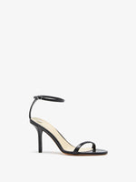 3/4 Front image of Slash Ankle Strap Sandals in Black