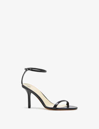 3/4 Front image of Slash Ankle Strap Sandals in Black
