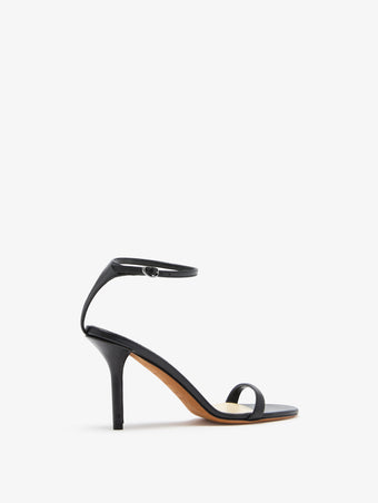 3/4 Back image of Slash Ankle Strap Sandals in Black