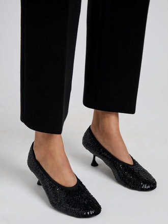 Proenza Schouler Image of model wearing Tee Sequin Pumps in Black