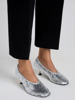 Proenza Schouler Image of model wearing Tee Sequin Pumps in Silver