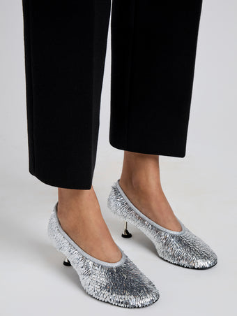 Proenza Schouler Image of model wearing Tee Sequin Pumps in Silver