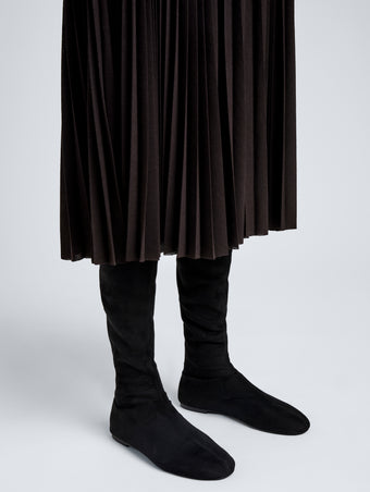 Proenza Schouler Image of model wearing Tee Stretch Over The Knee Boots in Black