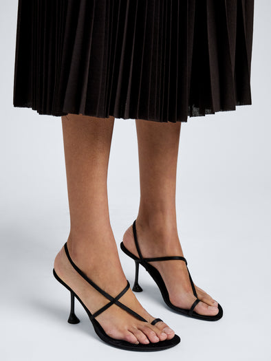 Proenza Schouler Image of model wearing Tee Slingback Sandals in Satin in Black