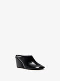 Proenza Schouler 3/4 Front image of Slant Mules in Slick Calf in Black