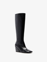 Proenza Schouler 3/4 Front image of Slant Boots in Slick Calf in Black