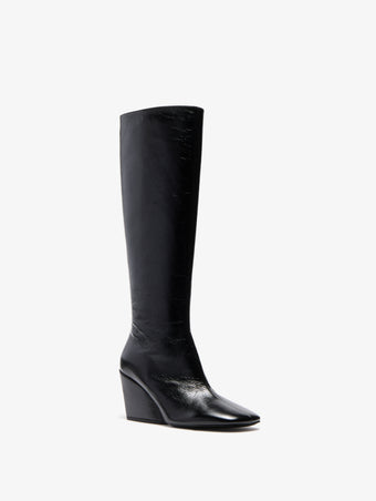 Proenza Schouler 3/4 Front image of Slant Boots in Slick Calf in Black