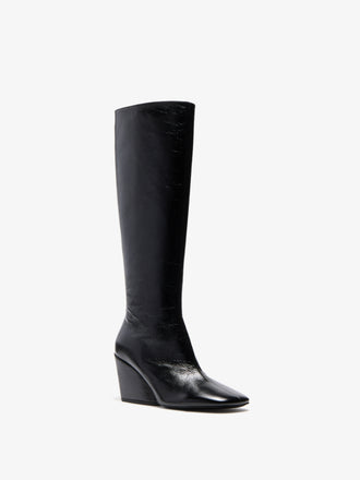Proenza Schouler 3/4 Front image of Slant Boots in Slick Calf in Black