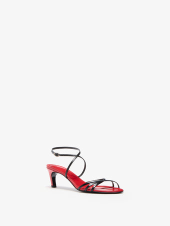 Proenza Schouler 3/4 Front image of Uma Ankle Strap Sandals in BlackRed Combo