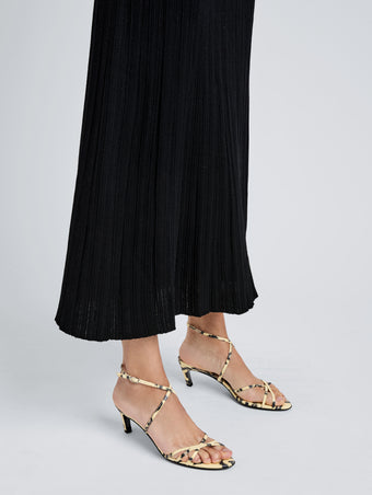 Proenza Schouler Image of model wearing Uma Ankle Strap Sandals in Embossed Python in Resin Multi