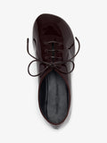 Proenza Schouler Aerial image of Glove Lace Up Flats in Soft Patent in Currant