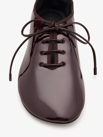 Detail image of Glove Lace Up Flats in Nappa in Currant