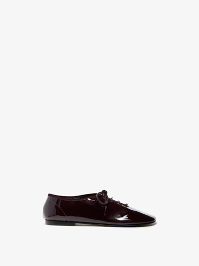 Proenza Schouler Front image of Glove Lace Up Flats in Soft Patent in Currant