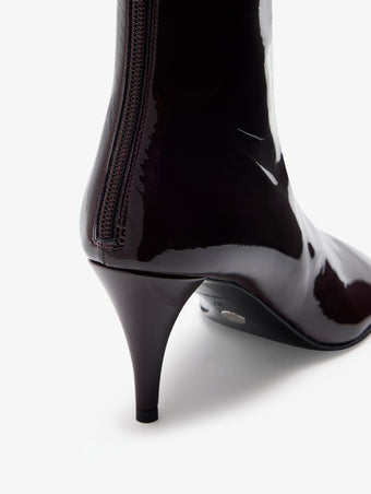 Detail image of Glove Ankle Boots in Soft Patent in Black