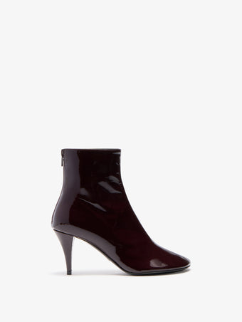 Proenza Schouler Front image of Glove Ankle Boots in Soft Patent in Currant