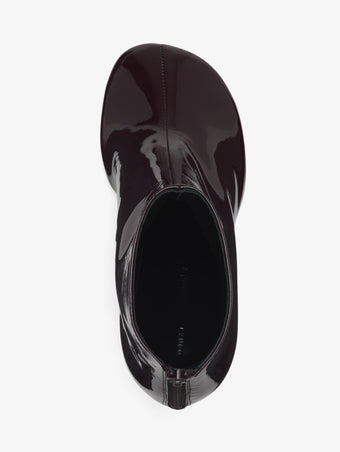 Proenza Schouler Aerial image of Glove Ankle Boots in Soft Patent in Currant