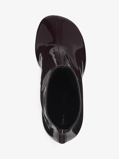 Proenza Schouler Aerial image of Glove Ankle Boots in Soft Patent in Currant