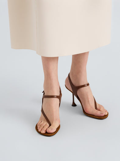 Proenza Schouler Image of model wearing Tee 85 Thong Sandal In Embossed Lizard Combo in Cuoio
