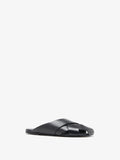 Proenza Schouler 3/4 Front image of Slant Cross Slides In Brushed Calf in Black