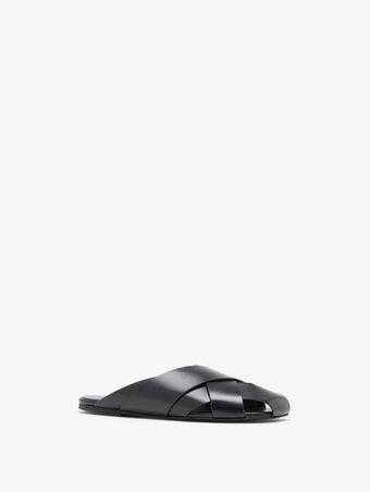 Proenza Schouler 3/4 Front image of Slant Cross Slides In Brushed Calf in Black