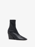 Proenza Schouler 3/4 Front image of Slant Stretch Boots in Black