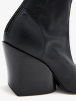 Proenza Schouler Detail image of Slant Stretch Boots in Black