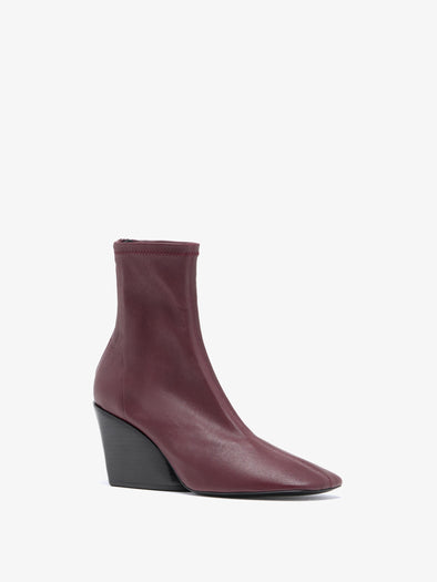 Proenza Schouler 3/4 Front image of Slant Stretch Boots in Oxblood