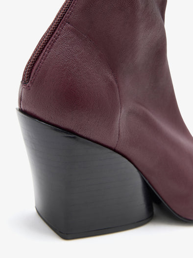Proenza Schouler Detail image of Slant Stretch Boots in Oxblood
