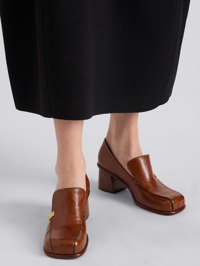 Proenza Schouler Image of model wearing Esme Loafer in Nappa Latex in Cuoio
