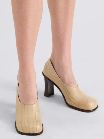 Proenza Schouler Image of model wearing Esme 90MM Pump in Eel in Ivory