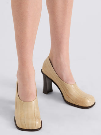 Proenza Schouler Image of model wearing Esme 90MM Pump in Eel in Ivory