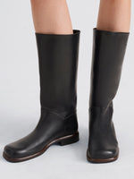 Proenza Schouler Image of model wearing Esme Boot in Shiny Calf in Black