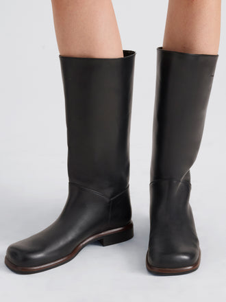 Proenza Schouler Image of model wearing Esme Boot in Shiny Calf in Black