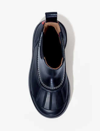 Proenza Schouler aerial 3/4 image of SOREL x Proenza Schouler CARIBOU Chelsea WP in BLACK/CHALK