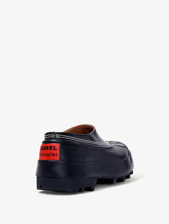 Proenza Schouler back 3/4 image of SOREL x Proenza Schouler CARIBOU Mule WP in BLACK/CHALK